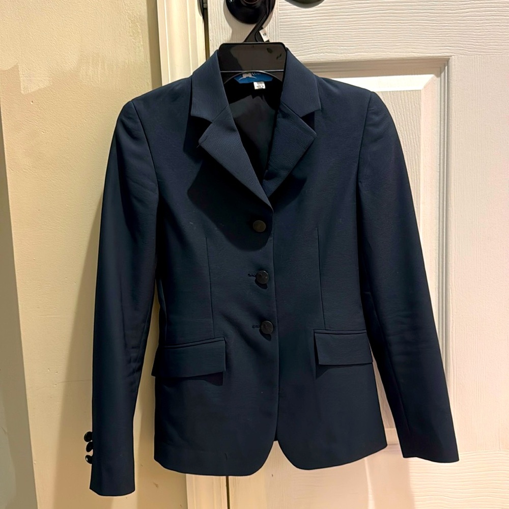 R.J. Classic Washable Show Coat size 12R
Like new condition.